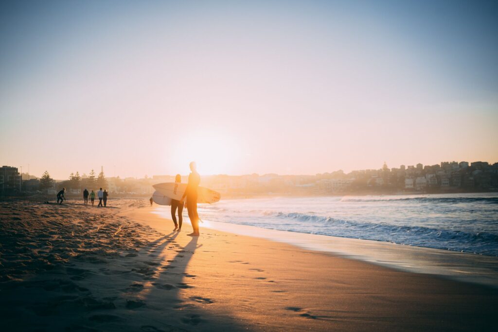 Why do surfers surf in early mornings?